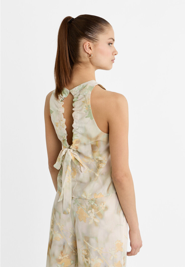 

Stradivarius Rückenfreies Neckholder-Top mit Print Steingrau XS