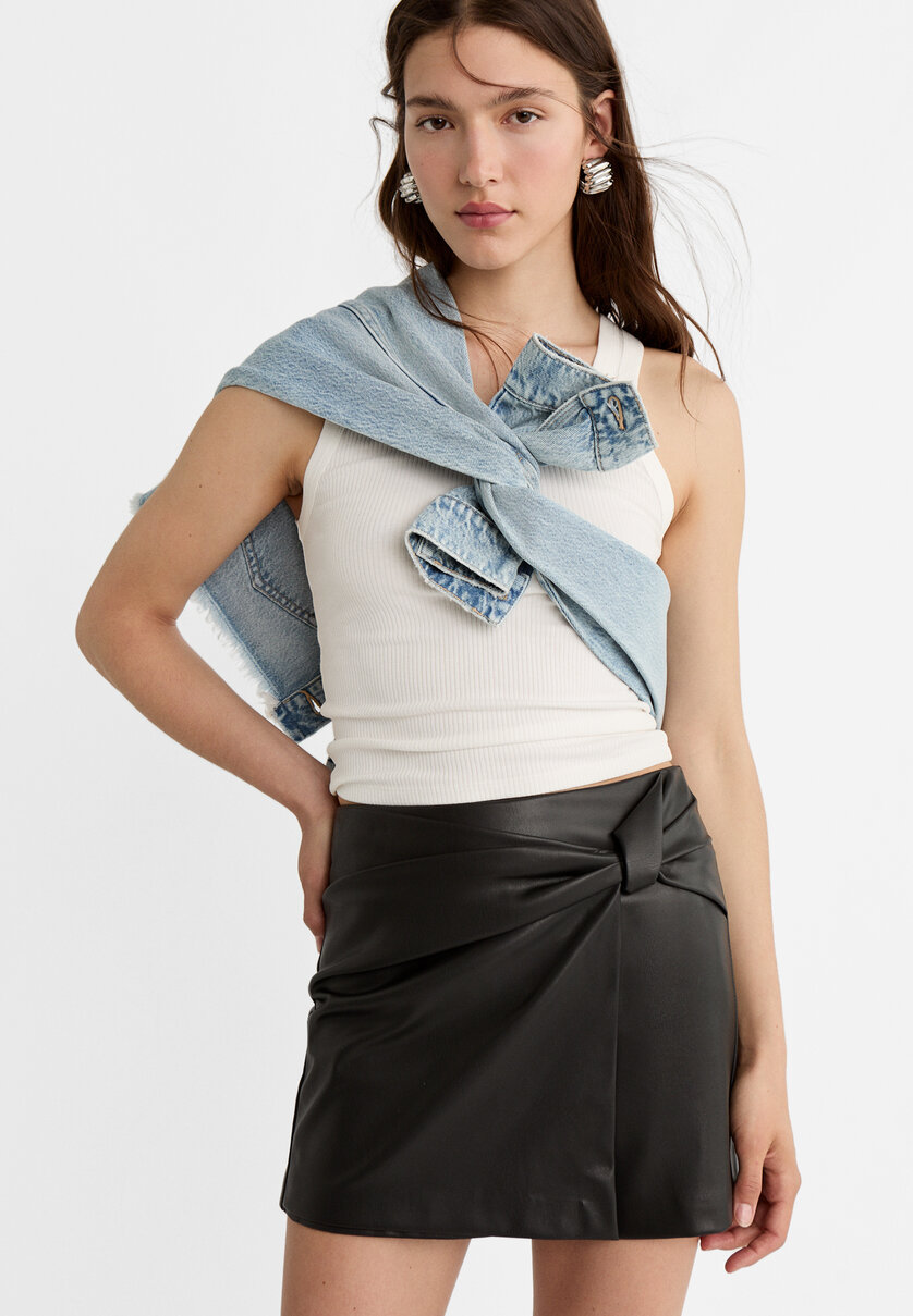 Leather effect skort with side bow