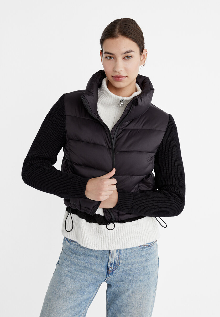 Puffer jacket with chunky knit sleeves