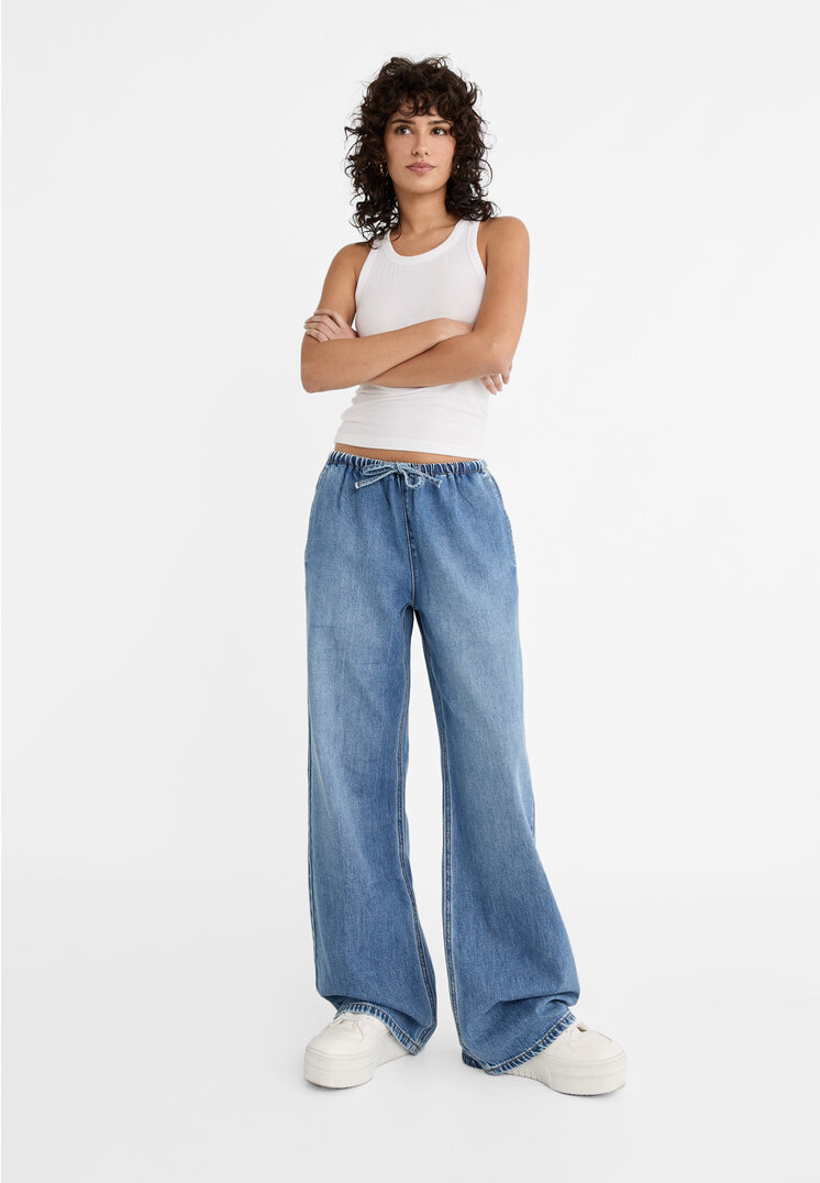

Stradivarius Jeansy wide leg ze sznurkiem w pasie Niebieski denim 38