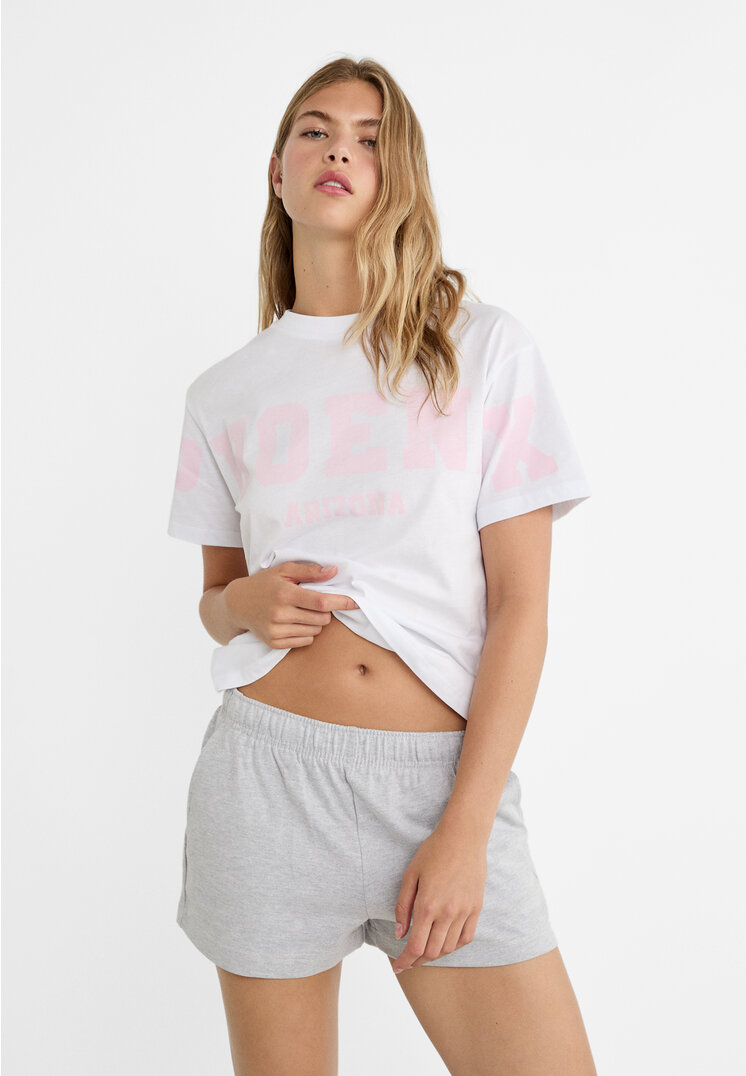 

Stradivarius Shirt mit Slogan Pastellrosa XL