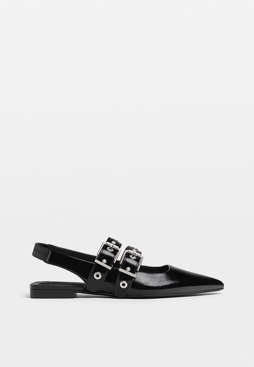 Flat shoes with buckle details