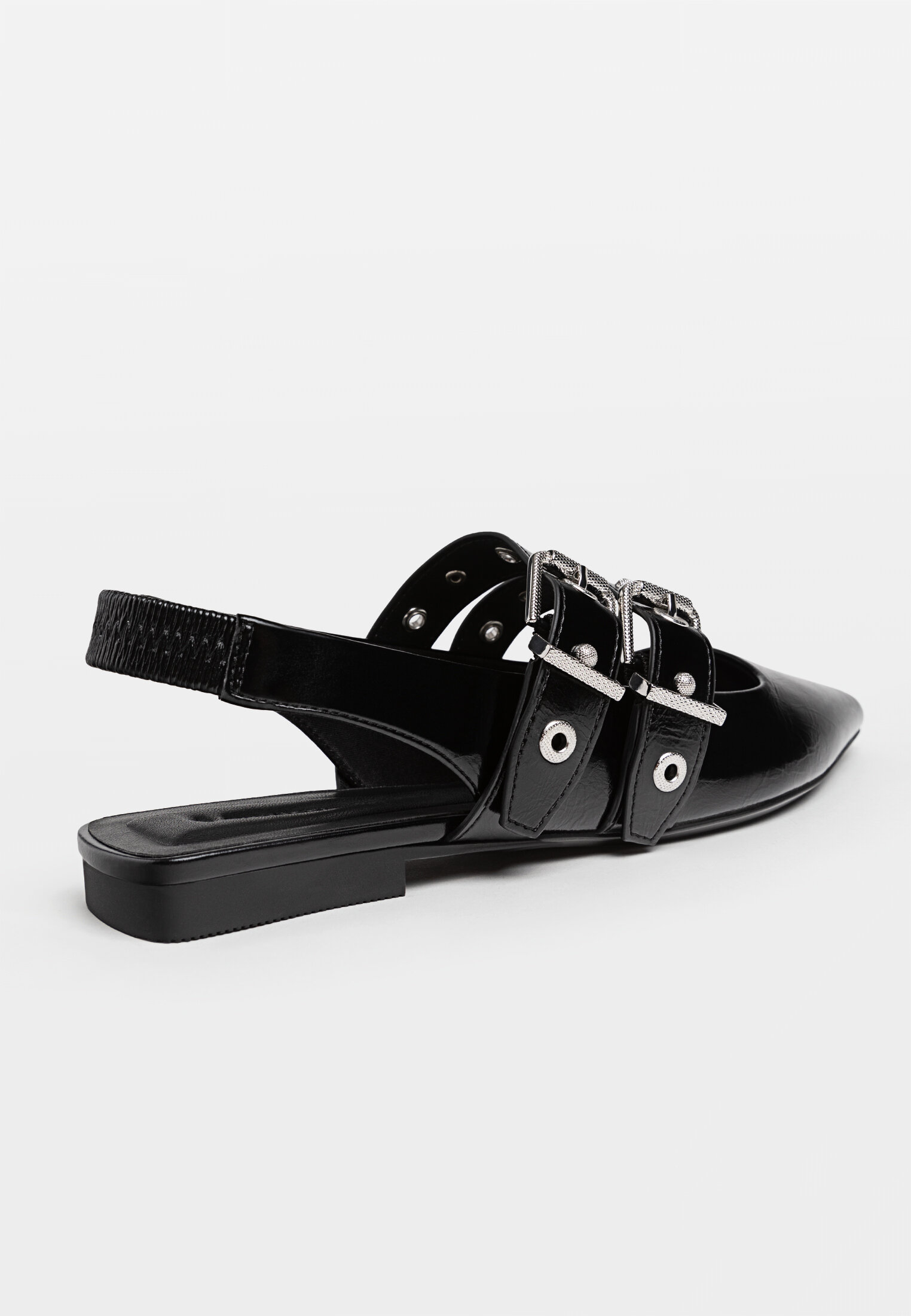 Flat shoes with buckle details
