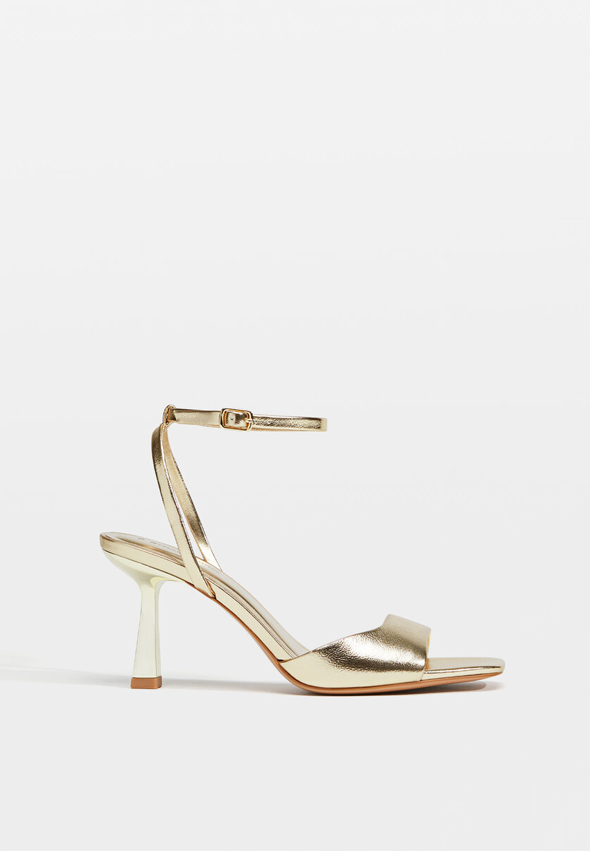 Golden stiletto heel sandals