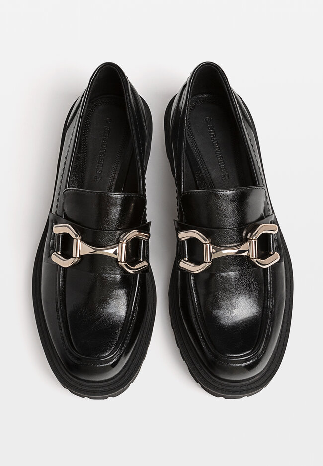 Black loafers with track soles