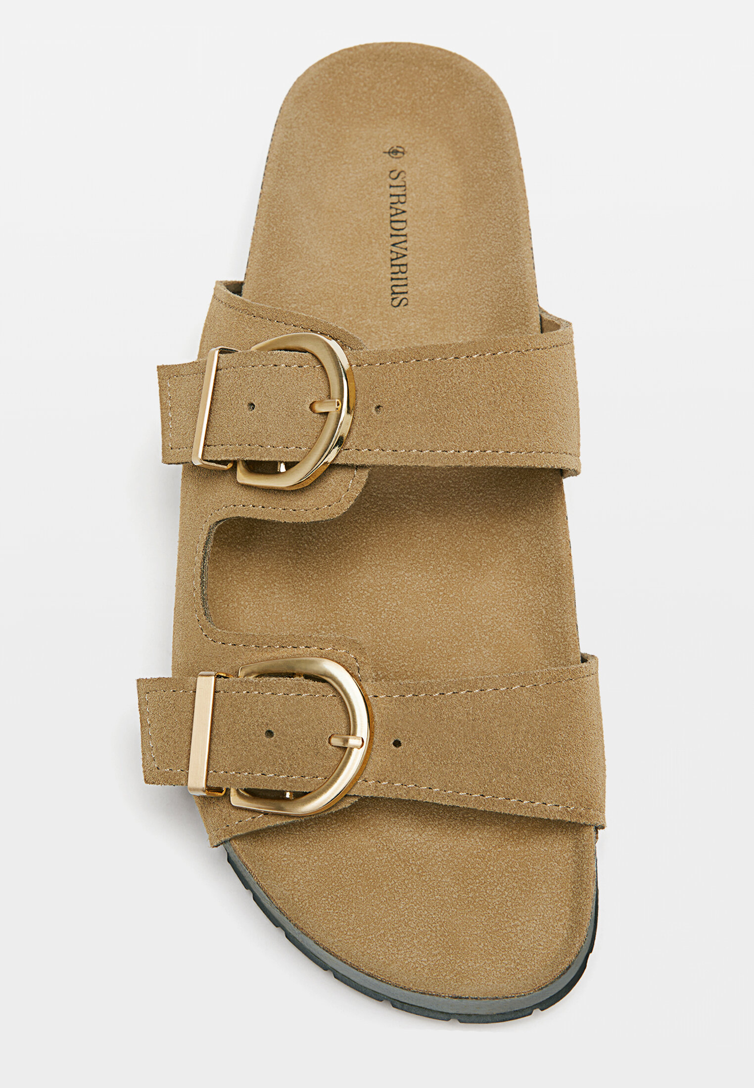 Flat leather sandals with buckles