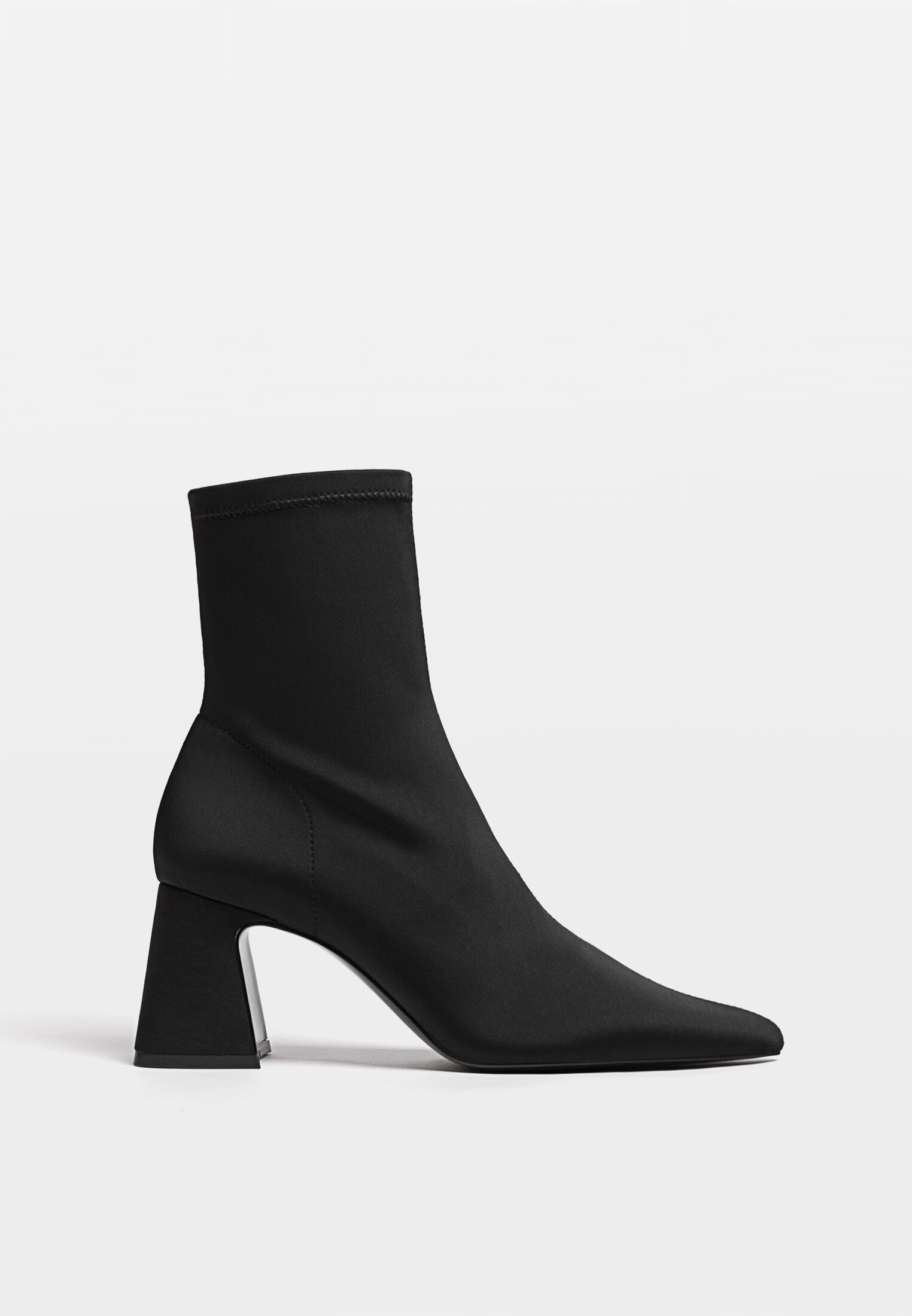 Black stretch high heel ankle boots