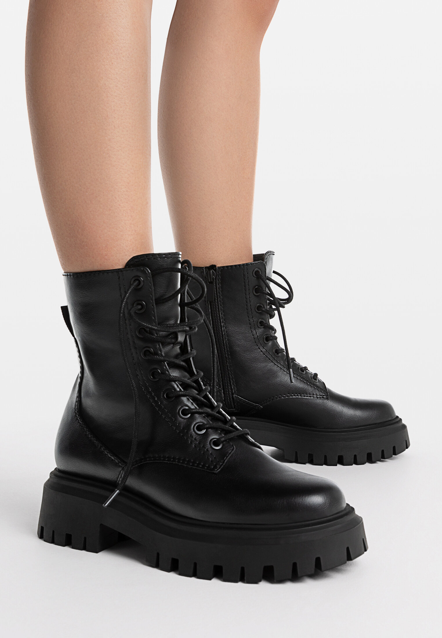 Flat lace up store leather boots