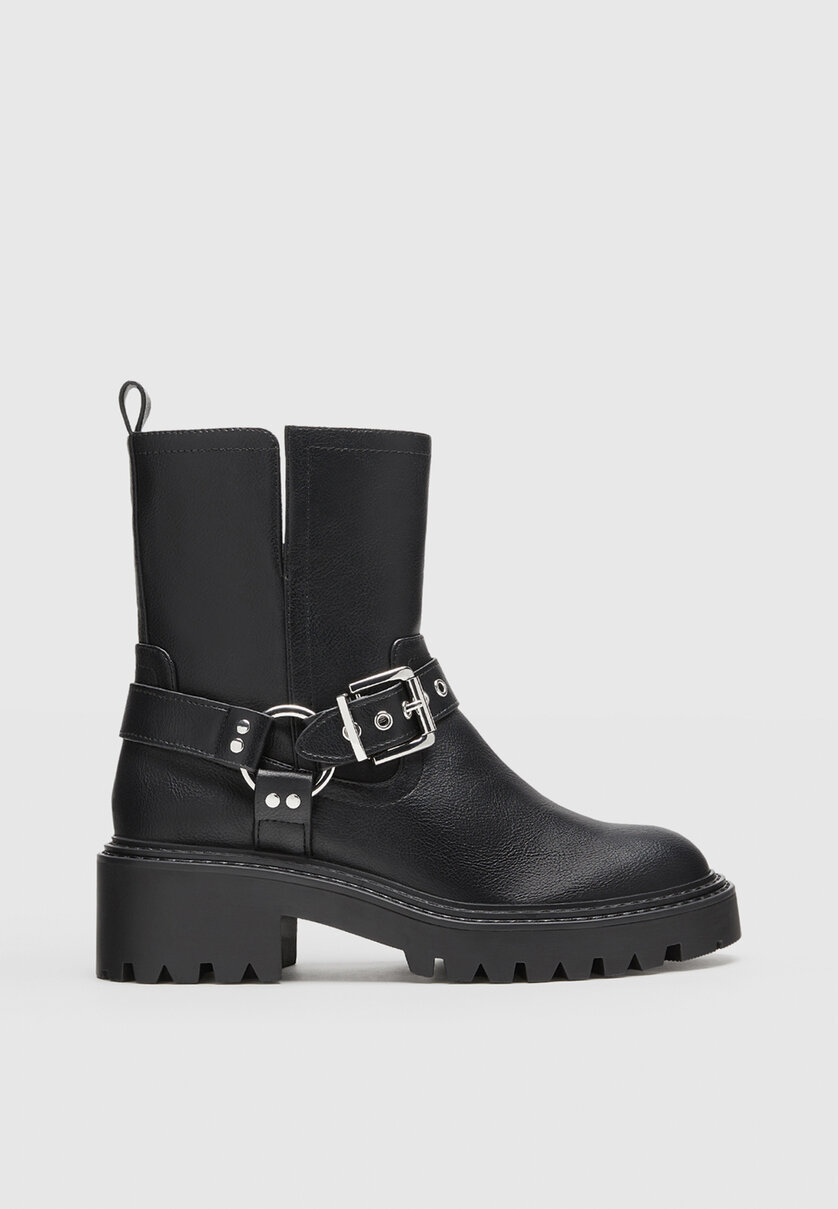 Flat biker ankle boots with buckle details