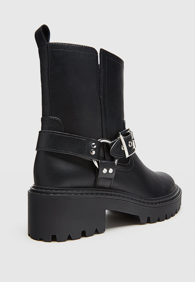 Flat biker ankle boots with buckle details