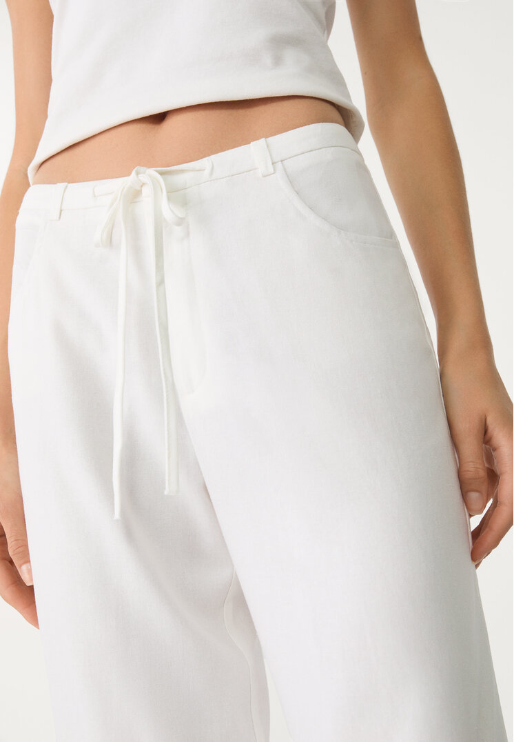 pantalon fluido bolsillos