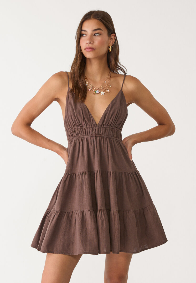 vestido fluido corto lazada espalda