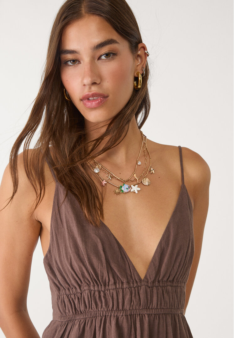 vestido fluido corto lazada espalda