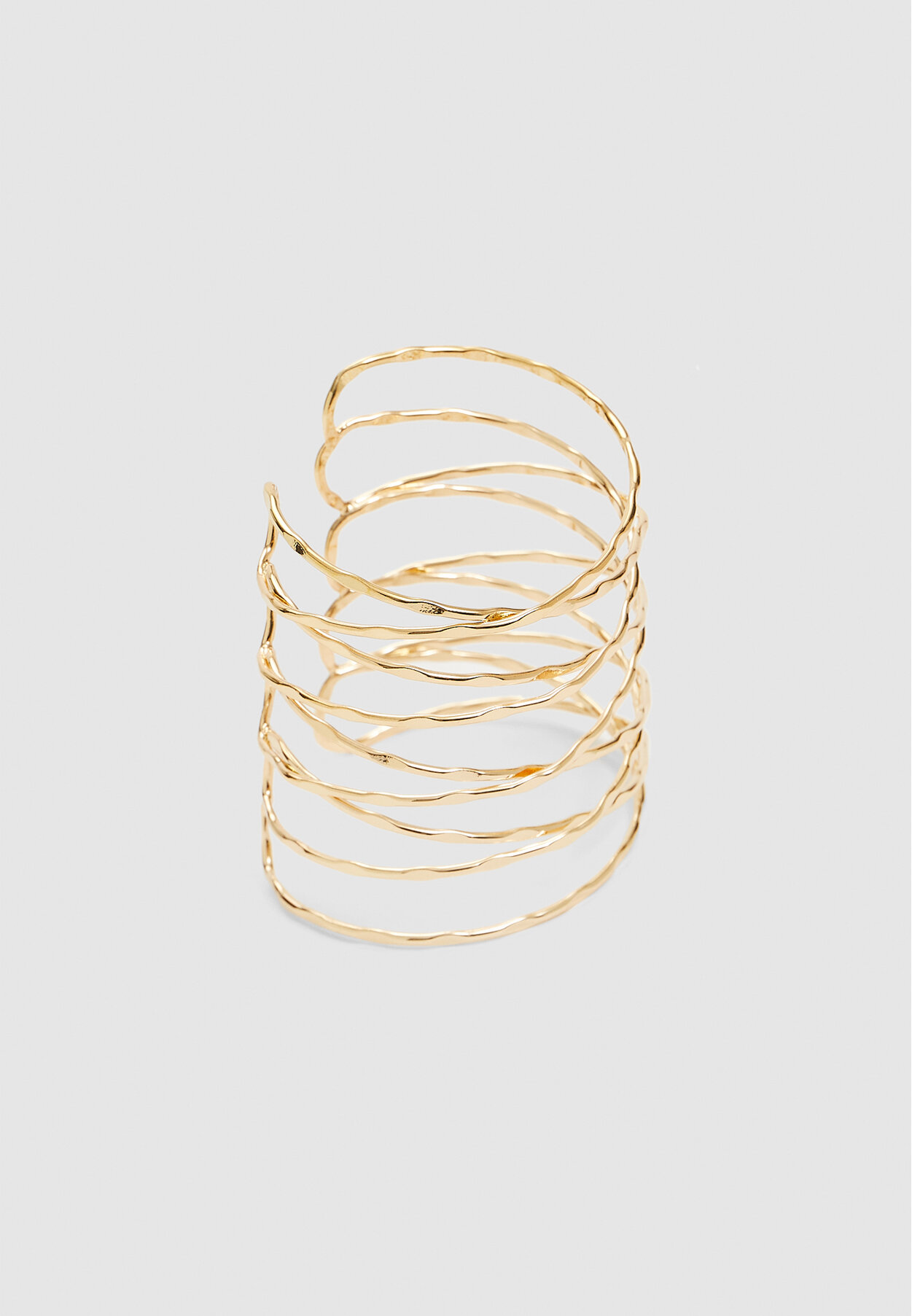Brazalete rígido circular entrecruzado