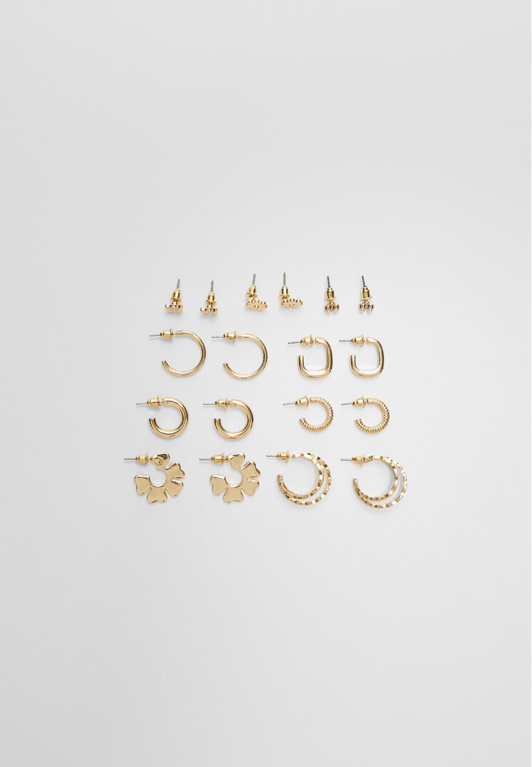 set 9 pendientes flor
