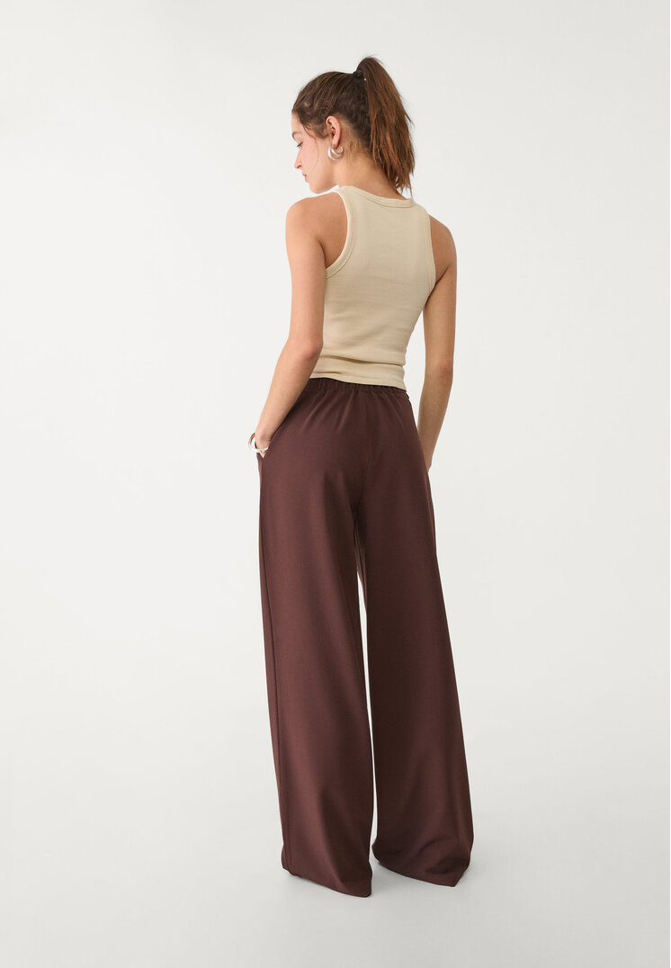 pantalon vestir ancho detalle hebilla