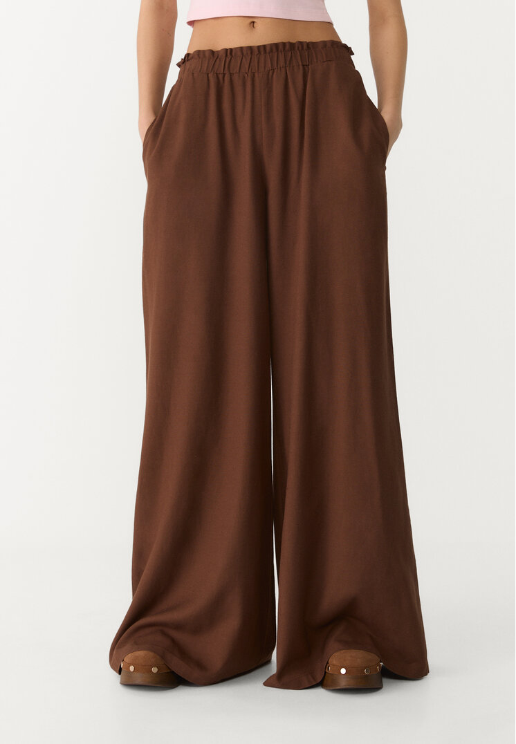 pantalon palazzo fluido con lino
