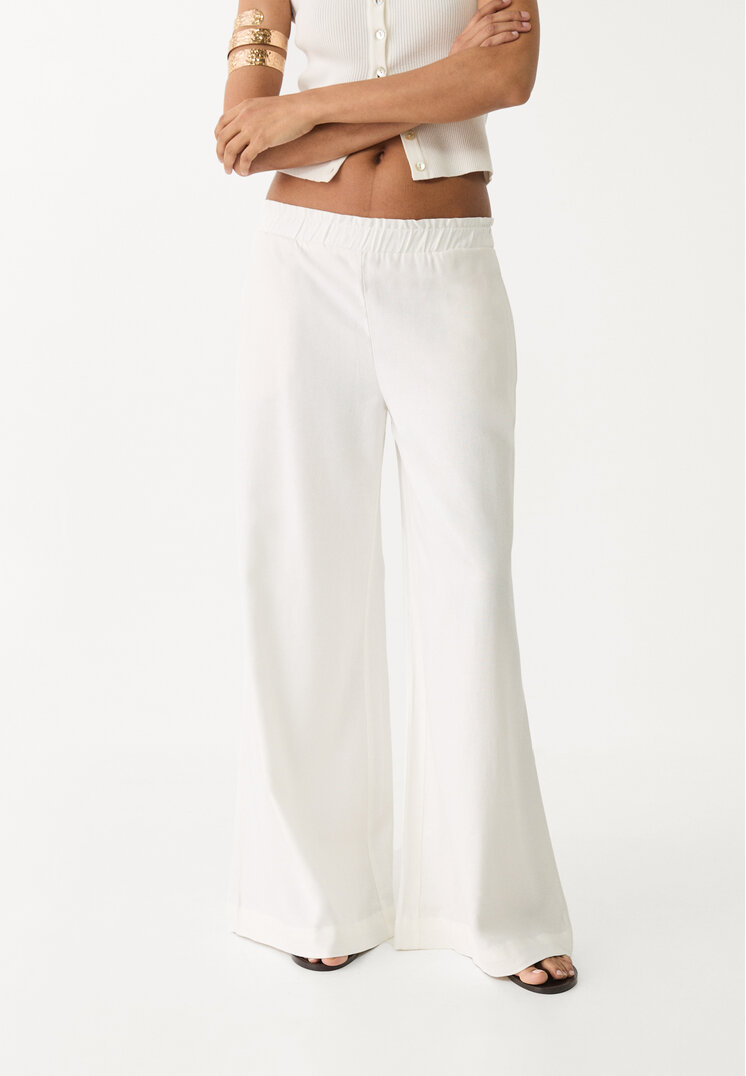 pantalon palazzo fluido con lino