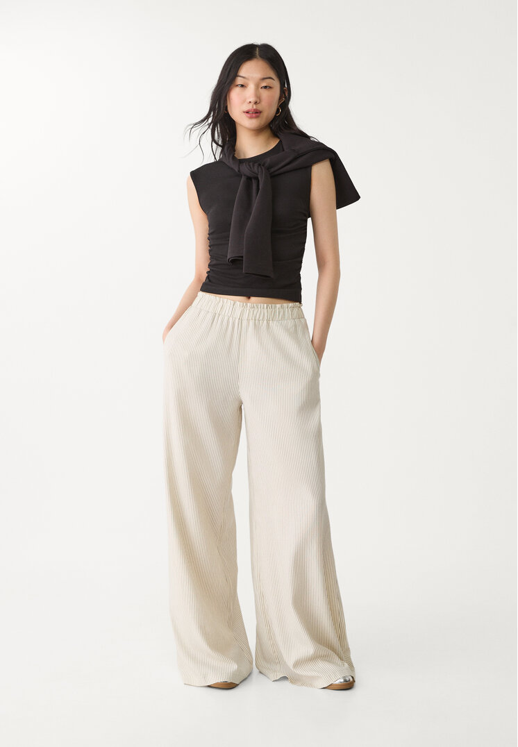 pantalon palazzo fluido con lino