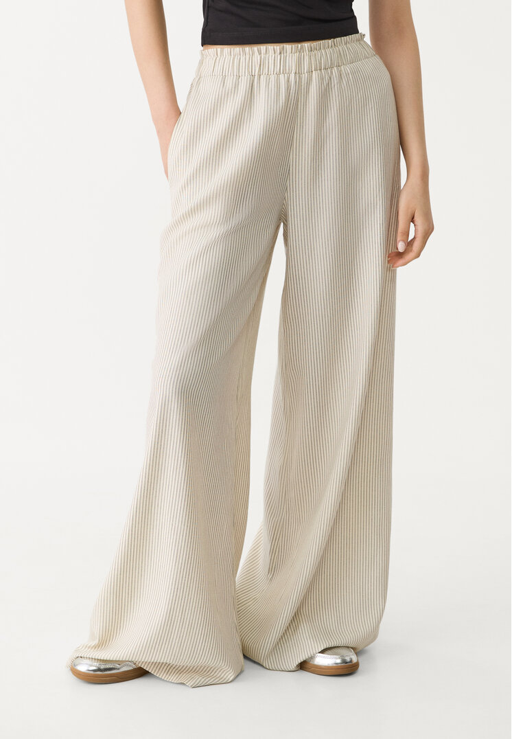 pantalon palazzo fluido con lino