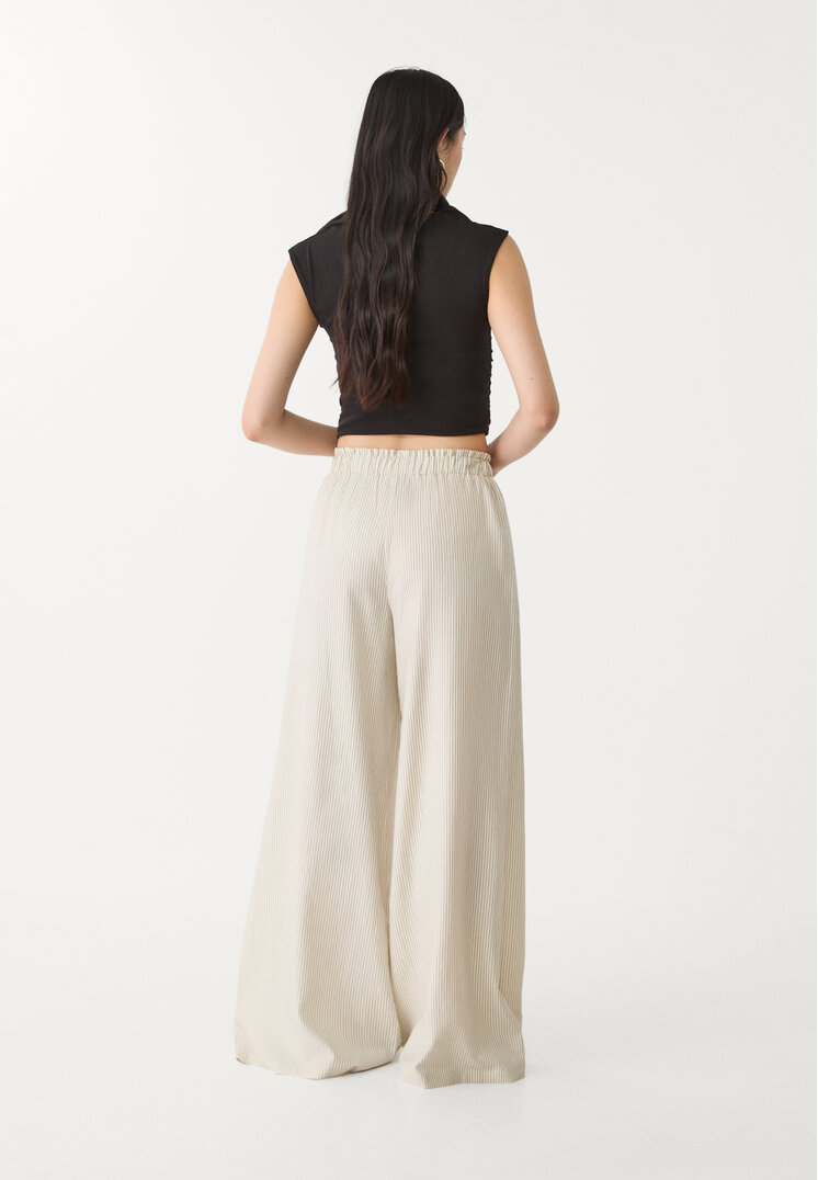 pantalon palazzo fluido con lino