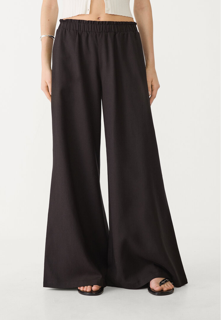 pantalon palazzo fluido con lino
