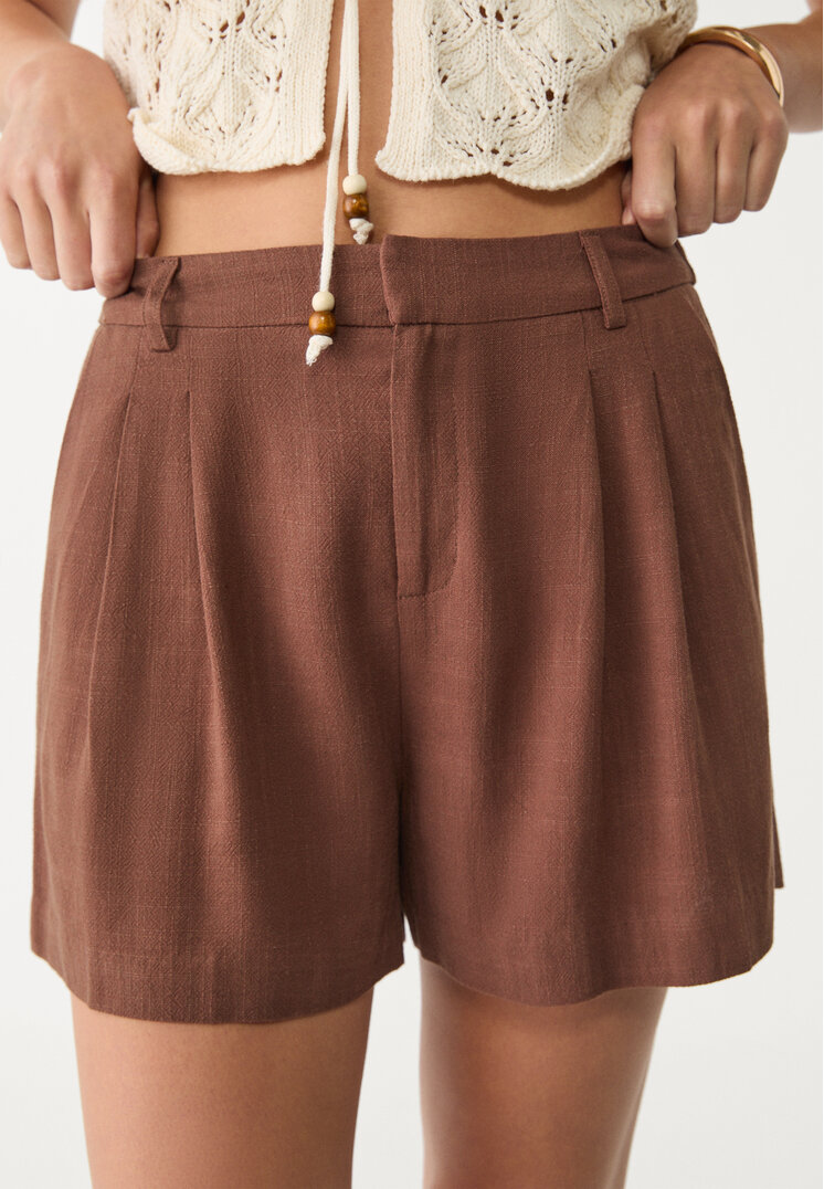 shorts fluido con lino
