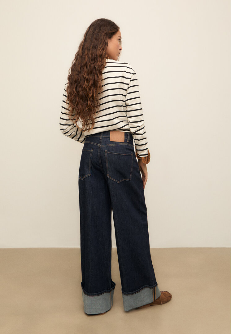 jeans wide leg detalle bajo