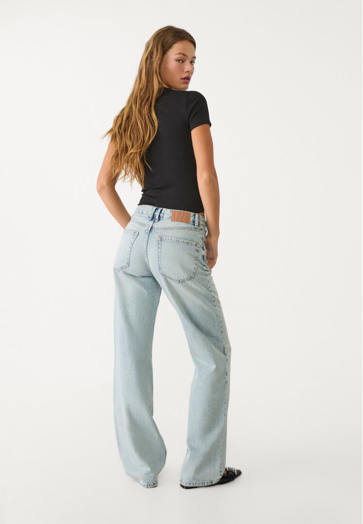 jeans straight fit cintura cruzada