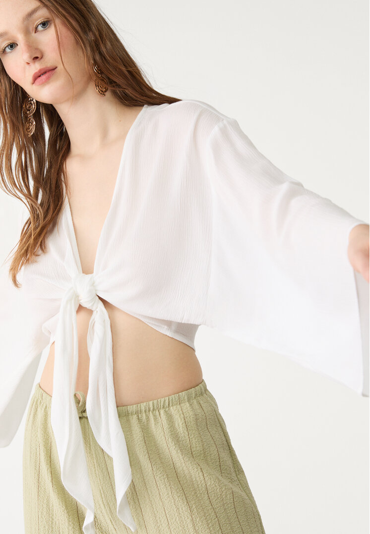blusa fluida nudo