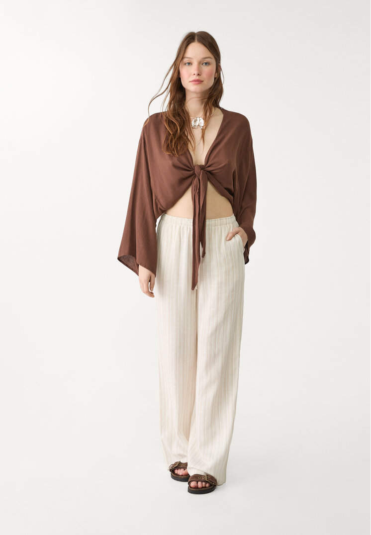 blusa fluida nudo