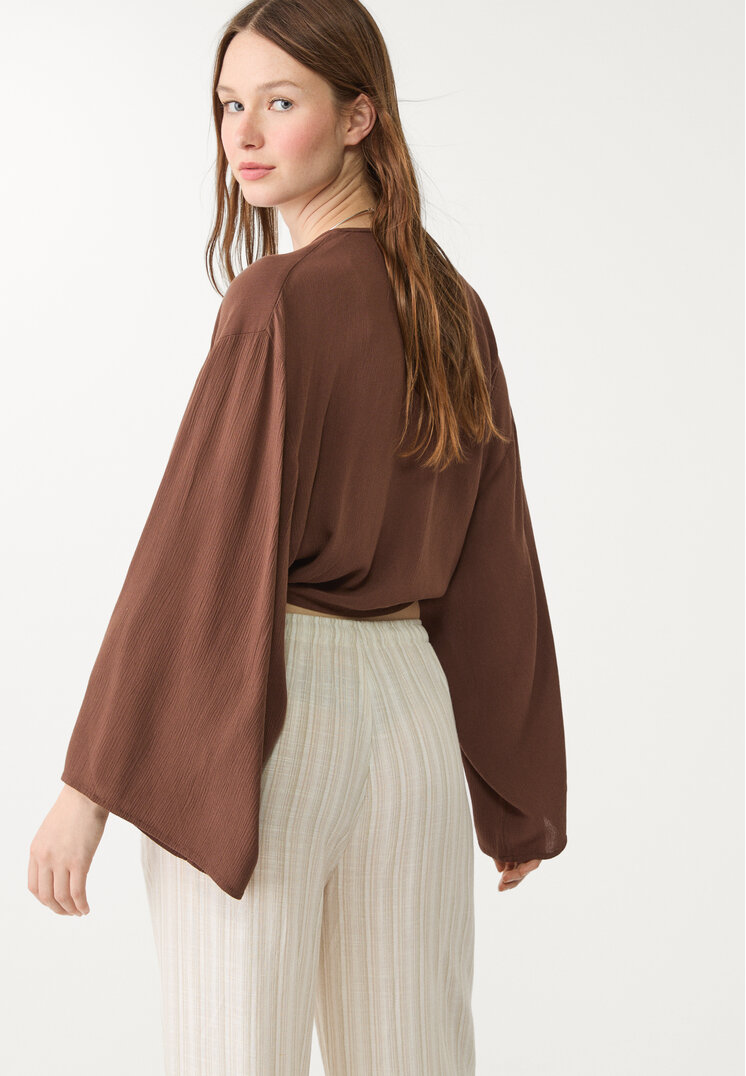 blusa fluida nudo
