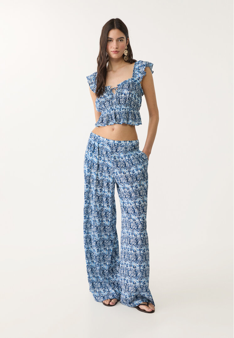top fluido volantes estampado