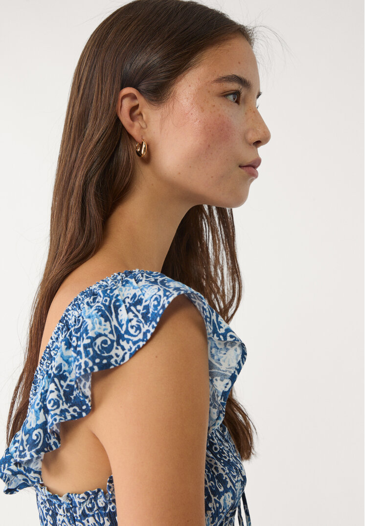 top fluido volantes estampado