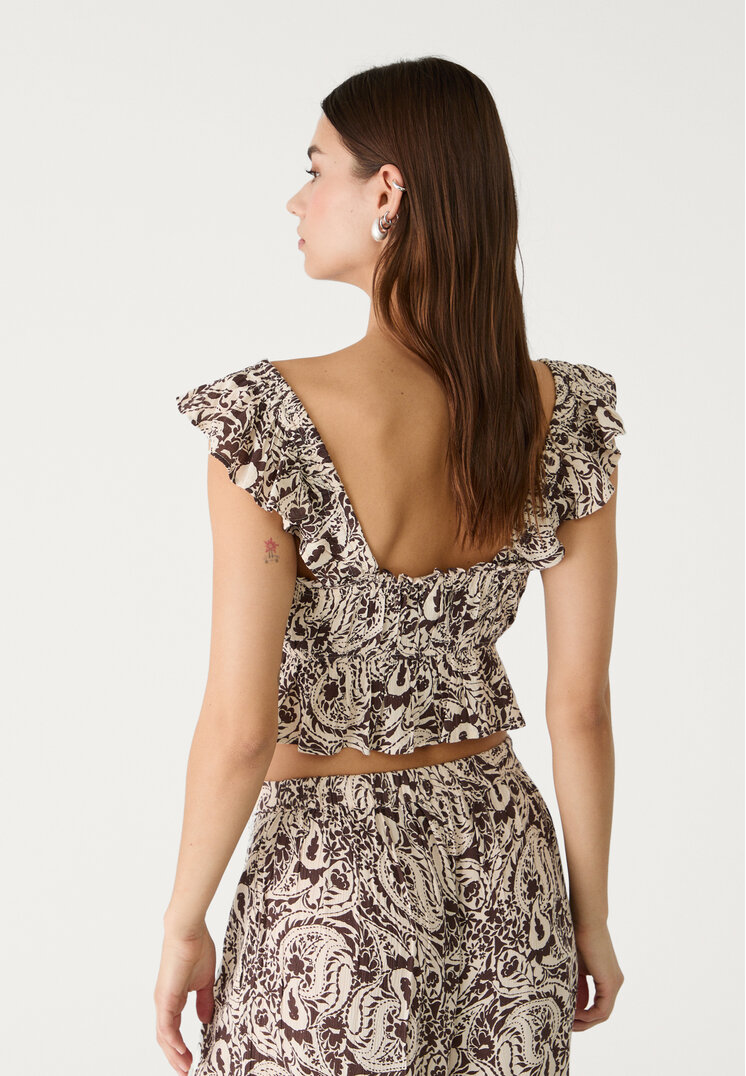 top fluido volantes estampado