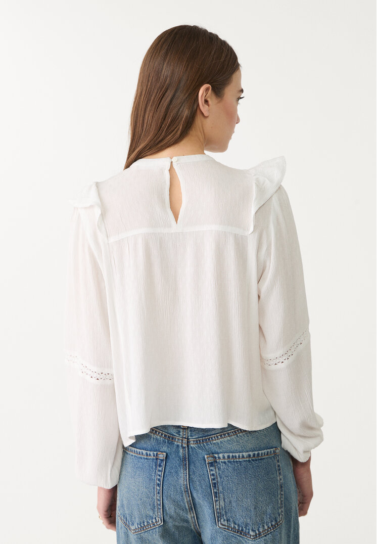 blusa fluida volantes
