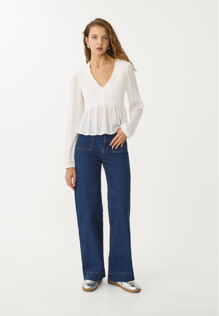blusa fluida volantes