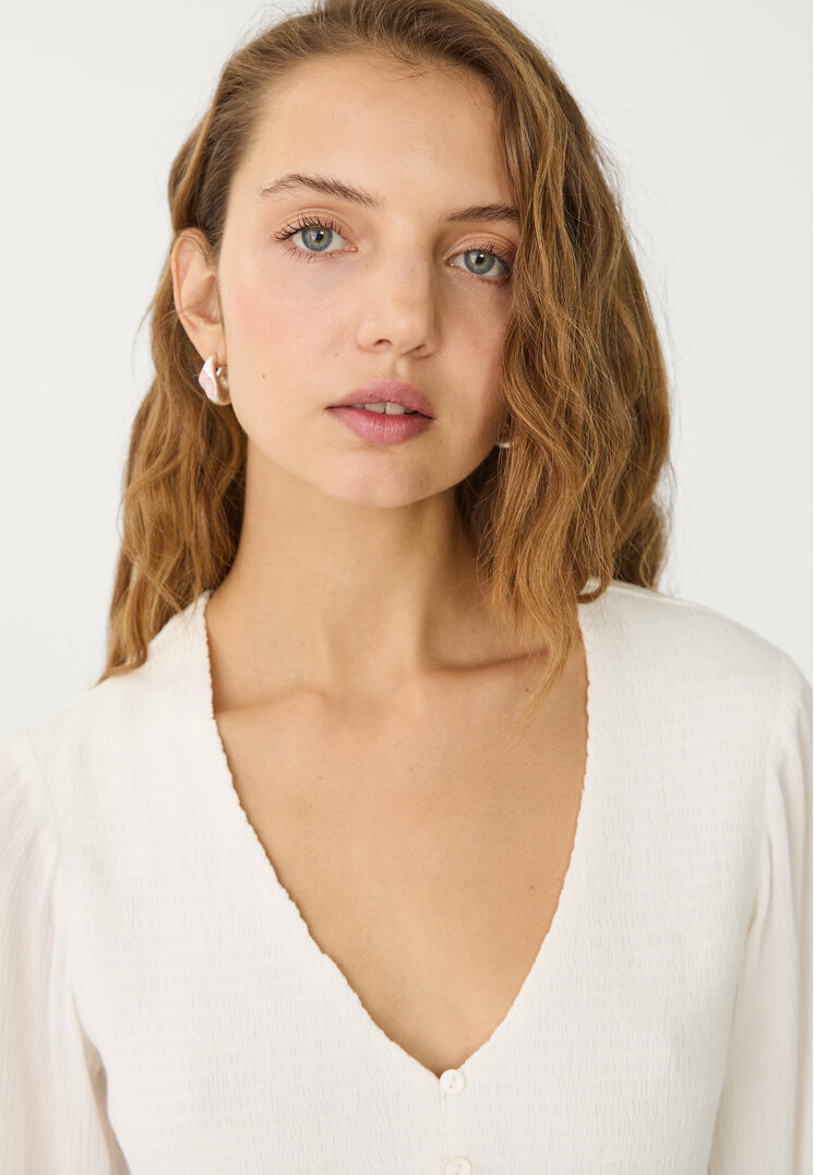 blusa fluida volantes