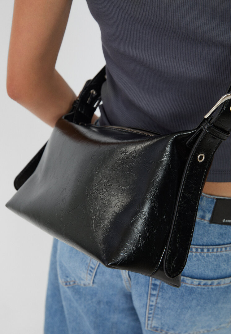 bolso bandolera tachas
