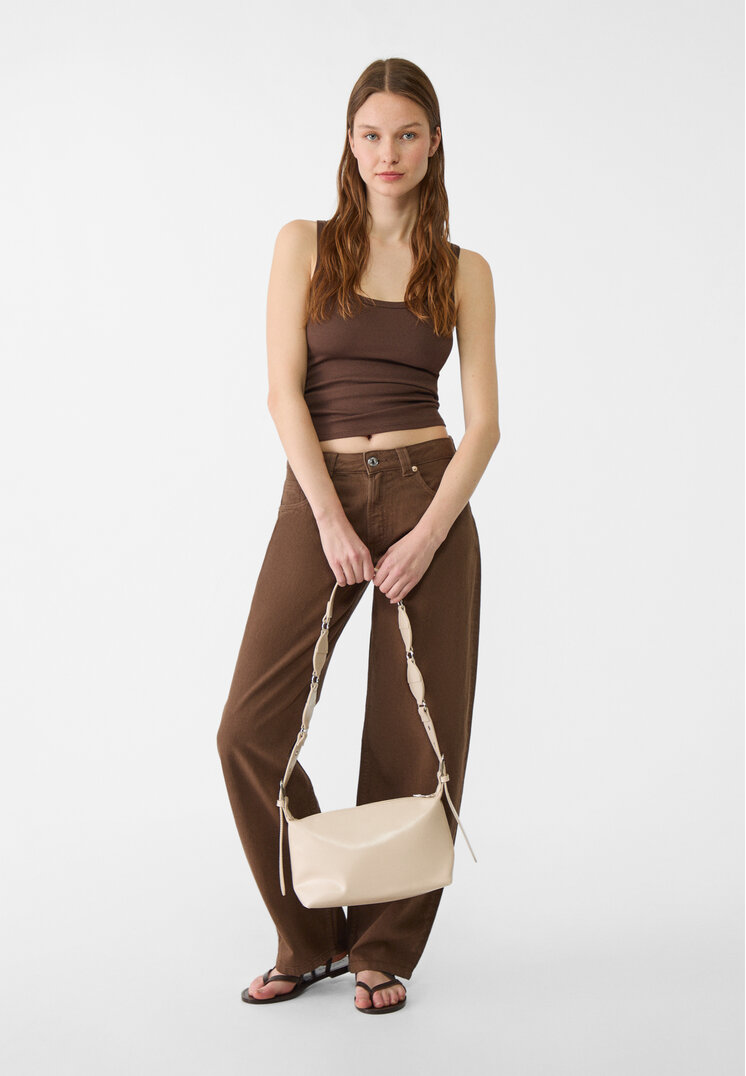 bolso bandolera tachas
