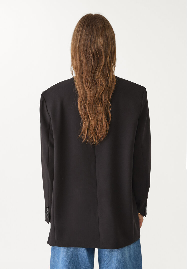 americana oversize bolsillos