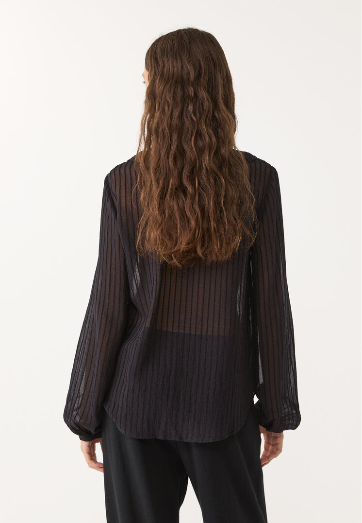 camisa fluida volantes