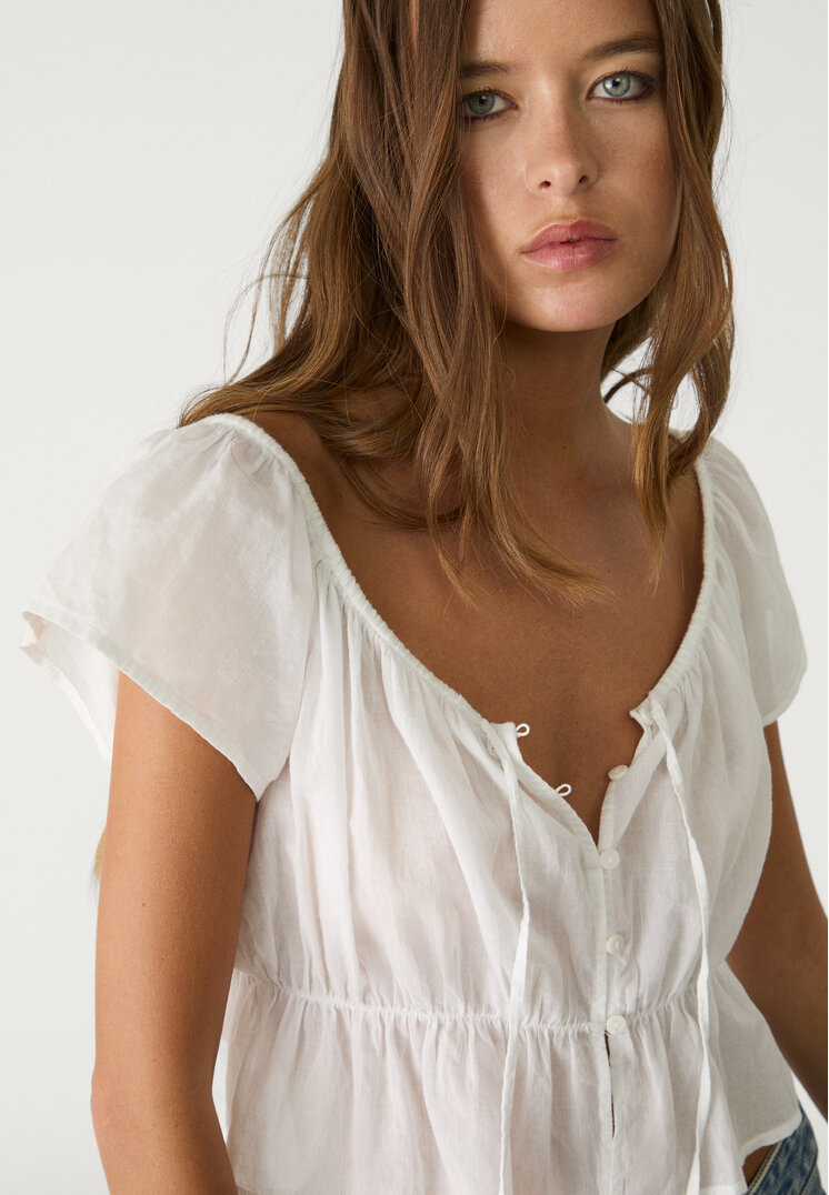 top fluido botones