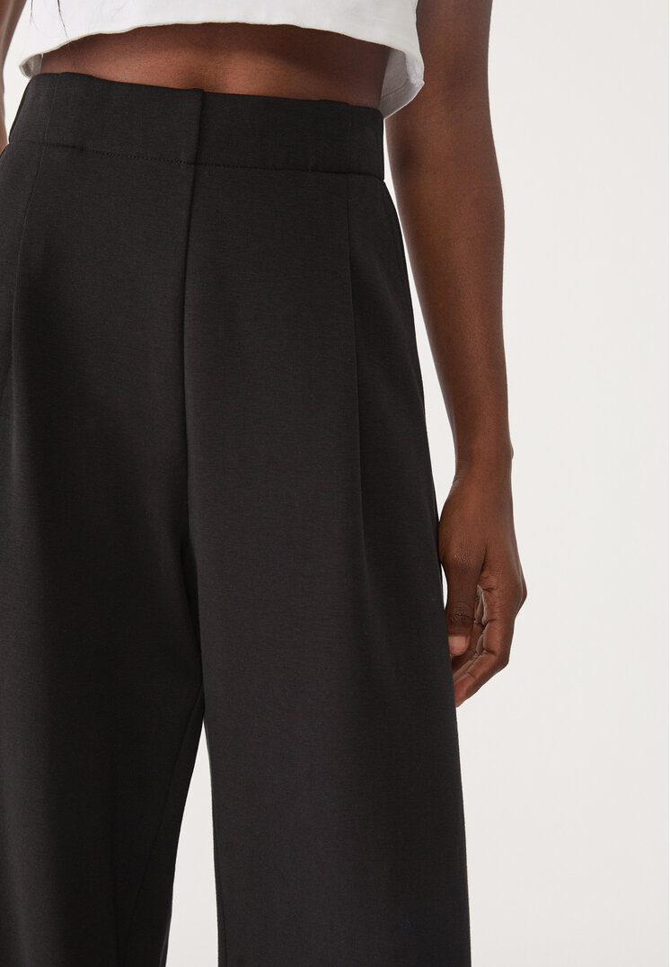 pantalon pinzas punto interlock