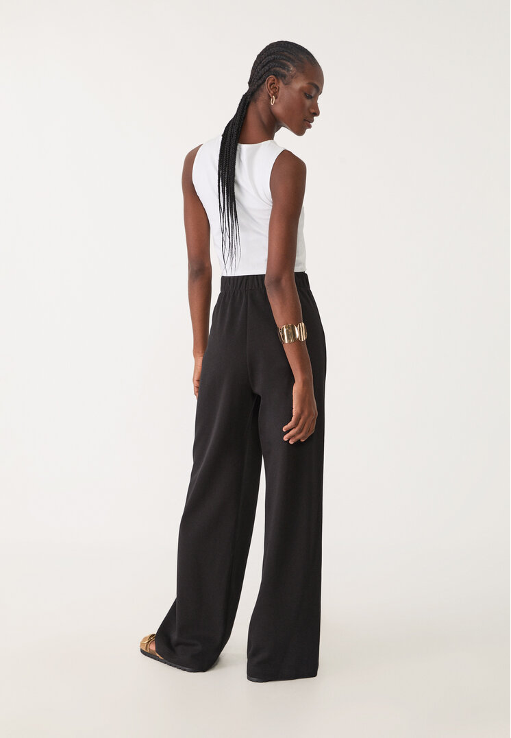 pantalon pinzas punto interlock