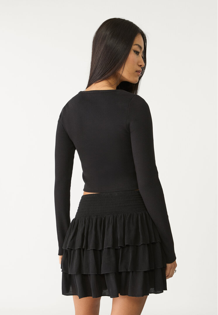 falda mini volantes