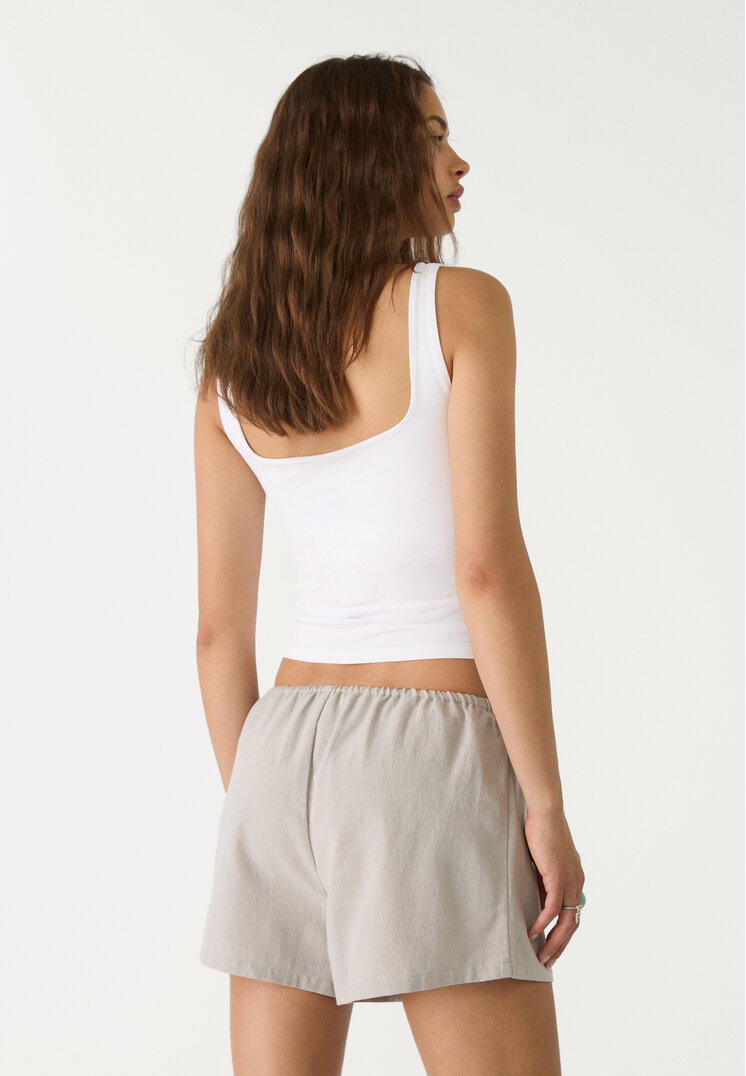 shorts fluido con lino