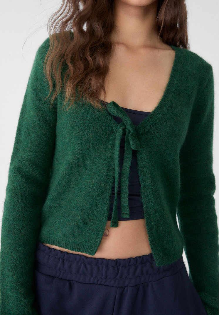 chaqueta punto lazada