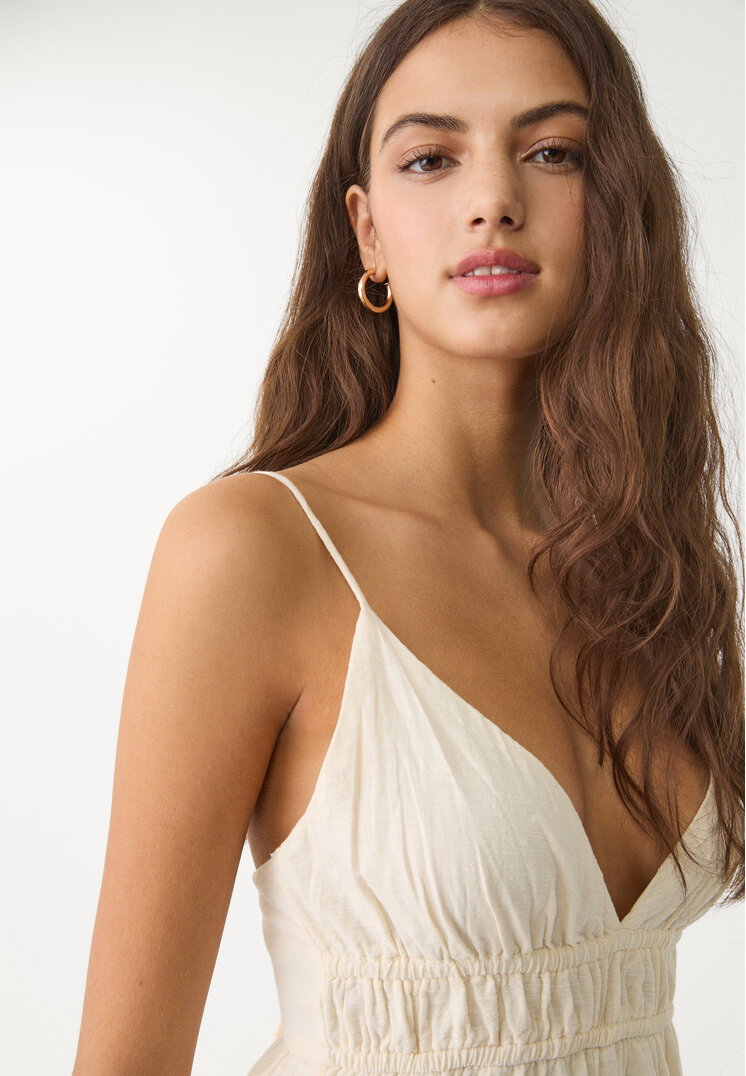 vestido fluido corto lazada espalda