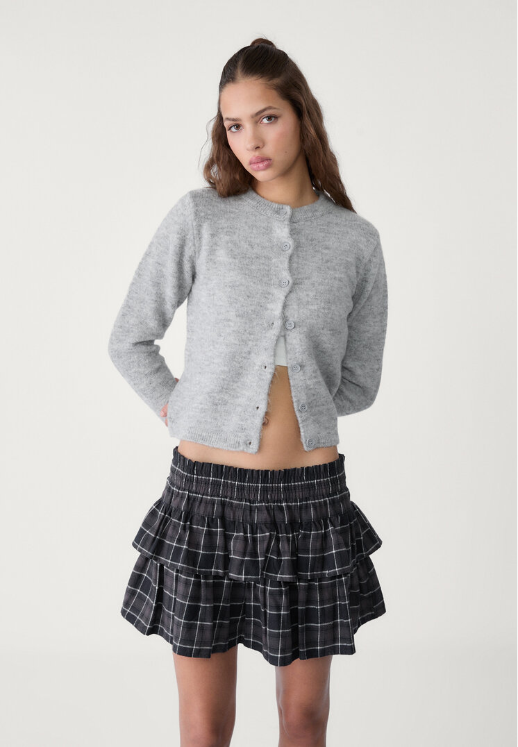 chaqueta botones punto